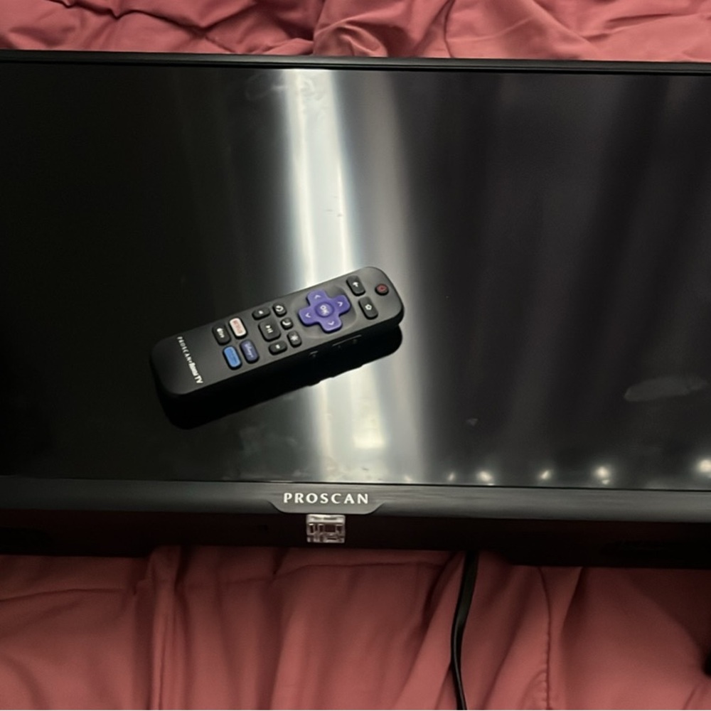 Roku Black and Purple Remote with Soundbar